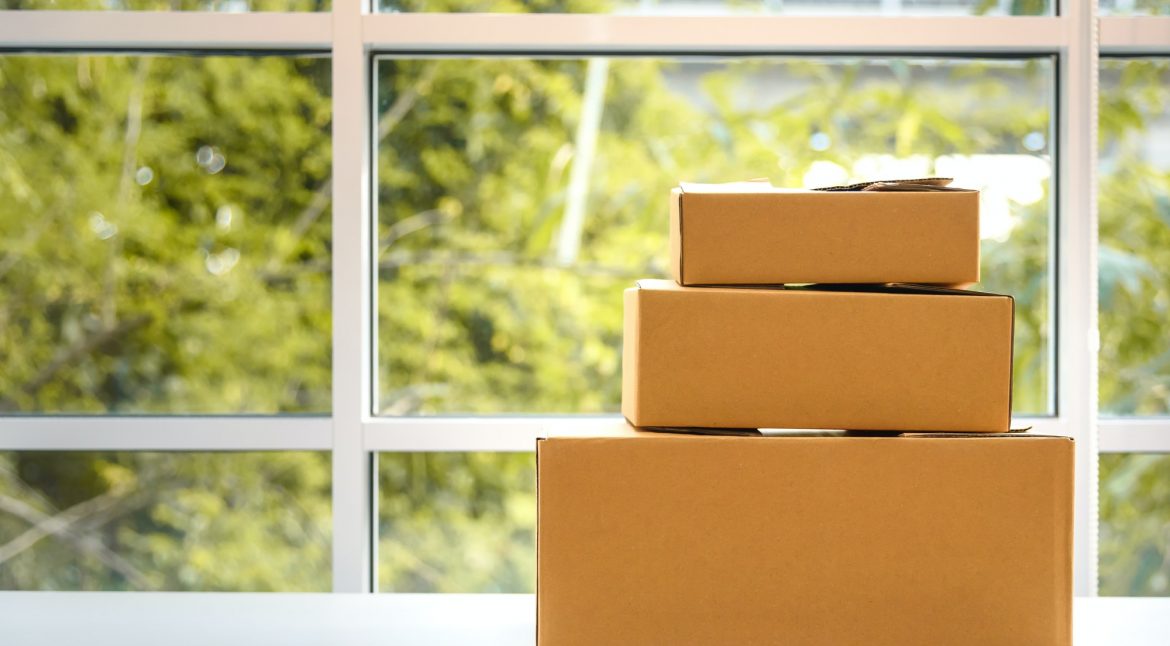 cardboard paper boxes on table, natural background, online shopping concept