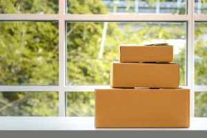 cardboard paper boxes on table, natural background, online shopping concept