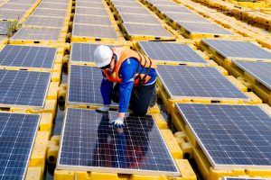 Renewable Energy Eco Technology Electric Power. Floating solar panels on lake.